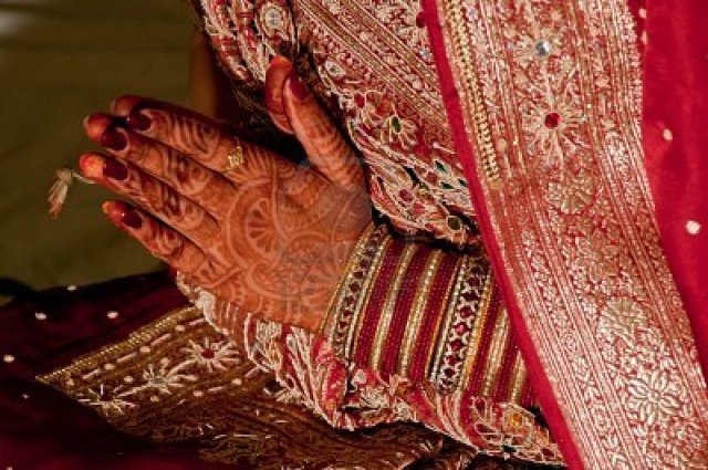 10689078-indian-wedding-bride-getting-henna-applied-marriage-engagement